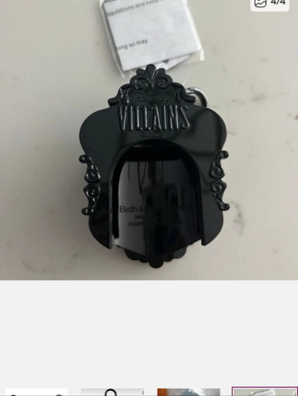 Bath & body works evil queen light up hand sanitizer holder with hand sanitizer.
